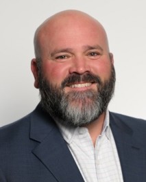 D. Adam Moore, J.D.